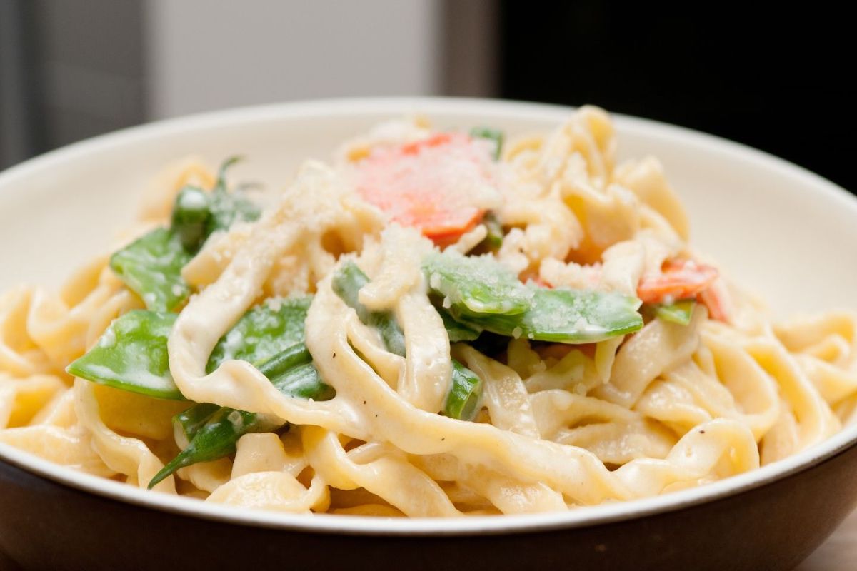 Holiday Pasta: Creamy Garlic Alfredo with Snow Peas and Carrots